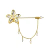 Aeridovanda Orchid Brooch in Gold and Palladium with Pearls