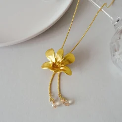 Dendrobium Thong Chai Orchid Long Slider Necklace in Gold with Crystal Tailends