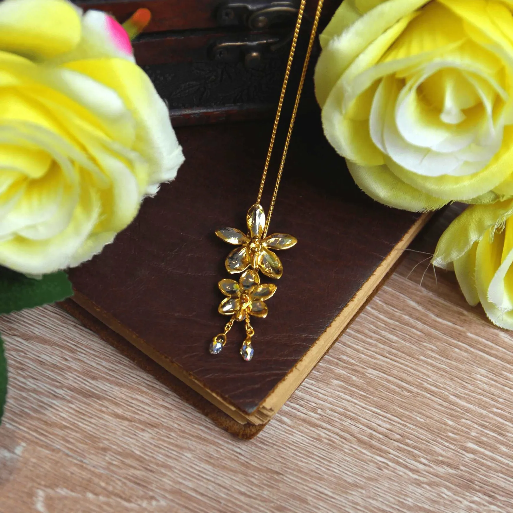 Dual Orchid Bloom Long Slider Necklace in Gold & Palladium with Crystal Tailends