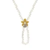 Orchid Pearl Necklace cum Brooch in Gold and Palladium